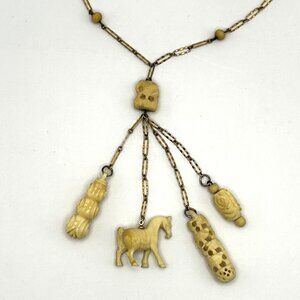 Vintage Vogue Jewelry Co Carved Dangling Charm Necklace Horse Floral Figural 17”